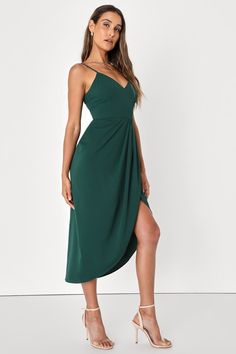 Let the allure of the Lulus Reinette Dark Green Midi Dress garner attention wherever you go! Stretch crepe knit shapes slender spaghetti straps that have an adjustable fit and support a figure-enhancing princess-seamed bodice. High waist tops a pleated overlapped midi skirt that lends a curve-enhancing faux wrap silhouette. Slight high-low hem adds an elegant finish. Hidden back zipper/clasp. Fit: This garment fits true to size. Length: Knee to mid-calf length. Size medium measures 45" from adju Cocktail Dress For Large Bust, Shoes With Dark Green Dress, Styling Spaghetti Strap Dress, Hunter Green Dress Outfit Wedding, Dark Green Bridesmaid Dresses Short, Highschool Homecoming, Casual Wedding Guest Dress, Dark Green Midi Dress, Dark Green Dress