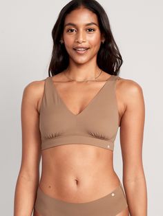 deep v-neck wide straps elastic-banded hem fitted high coverage hits above ribcage light support for a-c cups xs = 34a, 32b cup sizes s = 32c, 34b, 36a cup sizes m = 34c, 34d, 36B, 36c, 38b cup sizes l = 34d, 34dd, 36c, 36d, 38b, 40b cup sizes xl = 38dd, 40d, 40dd cup sizes xxl = 42d, 42dd cup sizes models are approx.  5'9" and wear sizes s (4), l (12), and xl (18)machine wash according to the care instruction label Bralette Top, Top Hits, Perfect Bra, Cup Sizes, Bralette Tops, Body Reference, Old Navy Women, Bra Women, Wide Straps