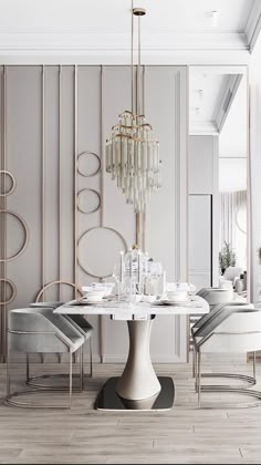 a dining room table with chairs and a chandelier