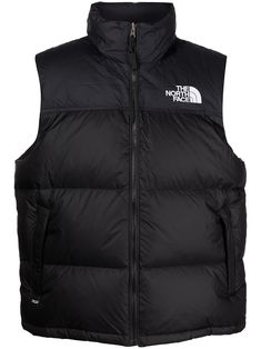 Black recycled nylon 1996 Retro Nuptse vest from THE NORTH FACE featuring down-feather filling, embroidered logo at the chest, embroidered logo to the rear, detachable hood, sleeveless, high neck, front zip fastening, two side zip-fastening pockets and straight hem. North Face Retro Nuptse, North Face Gilet, Nuptse Vest, The North Face 1996 Retro Nuptse, The North Face 1996, North Face 1996, Hooded Gilet, North Face Outfits, Stile Hijab