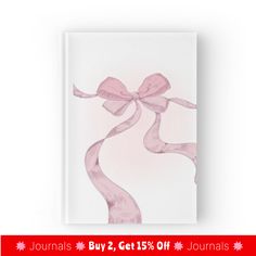 a pink book with a ribbon on the front and back cover that reads journals 2 get 15 % off