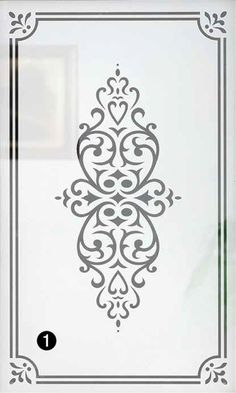 the stencil design is shown in black and white, with an ornate border