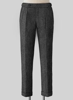 The Stone Charcoal Highland Tweed Trousers are the smartest dress that most men will need outside professional offices. Crafted from 100% wool, the trousers are beautifully tailored for a timeless appearance so that nothing can knock the blue pants in fine tweed. 
 
 Look Includes  Stone Charcoal Tweed Fabric  Cross Pocket  Forward 2 Pleats  Side Tabs (No Loops)- Arrow Shape  Bottom Cuff (1.5")  Two Welted Back Pockets on Trousers   
 You can change the look during customization if required. Elegant Fitted Tweed Bottoms, Formal Winter Wool Bottoms, Classic Winter Dress Pants, Elegant Tweed Pants For Business, Elegant Tweed Bottoms For Business, Classic Tailored Winter Pants, Classic Tailored Pants For Winter, Black Tweed Bottoms For Work, Wool Dress Pants For Winter Formal