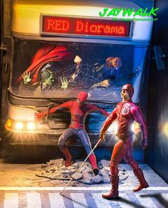 the amazing spider - man and his friend are in front of a bus with their costumes on