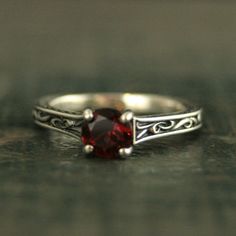 Garnet Open Ring Promise Ring, Garnet Ring As Gift With Round Band, Garnet Ring With Round Band As Gift, Garnet Solitaire Jewelry For Promise Ring, Garnet Rings Gift Round Band, Garnet Ring With Round Band For Gift, Garnet Open Ring For Anniversary, Garnet Solitaire Ring As Gift, Garnet Ring With Accent Stones For Promise