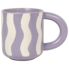 a purple and white coffee mug with wavy stripes