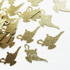 gold and silver glittered paper cut outs