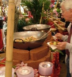 an older man is eating food at a buffet