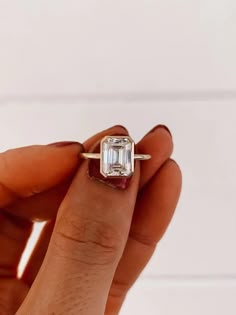 2.50CT Emerald Cut Moissanite Engagement Ring, Bezel Set Ring, Solitaire Ring, Wedding Ring, Emerald Cut Ring, Solid Rose Gold Promise Ring 💍 𝗠𝗲𝘁𝗮𝗹 💍 Metal: Yellow Gold, Rose Gold, White Gold, Sterling Silver (As per Selection) Purity: 9KT, 10KT, 14KT, 18KT, 925 for Silver (As per Selection) Assurance: All jewelry will come with stamping 💎 𝐌𝐨𝐢𝐬𝐬𝐚𝐧𝐢𝐭𝐞 𝐃𝐞𝐭𝐚𝐢𝐥𝐬 💎 Color Grade: D (Colorless) Clarity Grade: VVS1 Cut Grade: Excellent Polish: Excellent Symmetry: Excellent Fluorescence: Excellent Mohs scale hardness: 9.25 (Natural diamond has 10) Toughness: Excellent Diaphaneity: Transparent Specific gravity: 3.218-3.22 Refractive index: nω = 2.654 nε = 2.967 Birefringence: 0.313 (6H form) Dispersion: 0.104 Melting point: 2730 oC (decomposes) Solubility: None 💎 𝐌𝐚𝐢𝐧 ? Zen Moissanite, Emerald Cut Moissanite Engagement Ring, Yellow Gold Solitaire Ring, Rose Gold Promise Ring, Emerald Ring Engagement Diamond, Ring Emerald Cut, Emerald Cut Moissanite