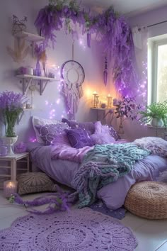 a bedroom decorated in purple and green with wistery decorations on the ceiling, bedding