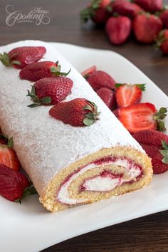 there is a roll with strawberries on it