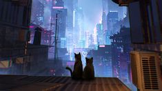 two cats sitting on the floor in front of a cityscape