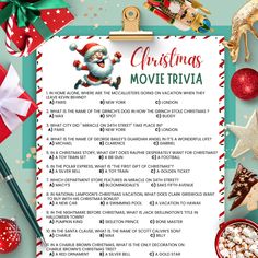 a christmas movie trivia with santa clause on it, surrounded by presents and decorations