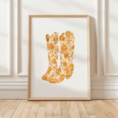 an art print of a pair of yellow boots