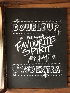 a sign that says double up on your favorite spirit for just $ 150 extra