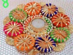 colorful broochies are arranged in the shape of a flower