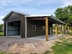 a large metal building with a garage attached to it