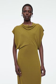 DRAPED COWL-NECK MIDI DRESS - KHAKI GREEN - COS Formal Sleeveless Midi Dress With Gathered Neckline, Spring Midi Dress With Ruched Bodice And Pre-draped Style, Fitted Cowl Neck Midi Dress For Date Night, Sleek Viscose Evening Dress, Elegant Party Dress With Gathered Neckline, Chic Silk Midi Dress With Gathered Neckline, Chic Silk Dress Made Of Viscose, Spring Midi Dress With Draped Sleeves, Elegant Mini Dress With Gathered Neckline