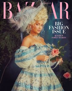 the cover of harper harper magazine with a woman in a blue dress and feathered hat