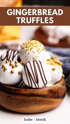 a wooden bowl filled with white and chocolate truffles