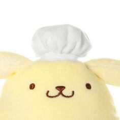 a stuffed animal with a chef's hat on it's head and ears