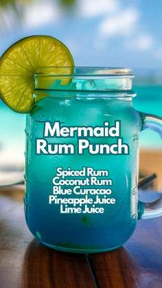 Mermaid Rum Punch Mermaid Rum Punch Recipe, Mermaid Rum Punch, Mermaid Cocktail Drinks, Bar Drink Specials Ideas, Summer Punch Alcohol, Blue Mixed Drinks, Coconut Rum Drinks Recipes, Blue Drinks Alcohol