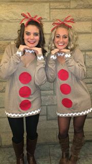 two women dressed up in costumes standing next to each other