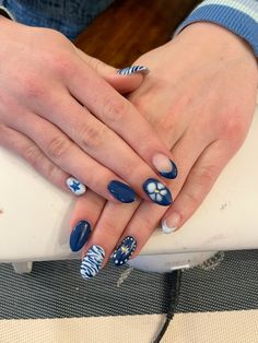 fun funky blue nail art for fall and winter nail inspo Almond Blue Heart Nails, Navy January Nails, Acrylic Nail Designs Navy Blue, Blue Winter Almond Nails, December Nail Ideas Blue, Navy And Light Blue Nails, Blue Square Nail Designs, Short Square Blue Nails, Funky Blue Nails