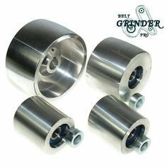 four aluminum wheel hubs for the front end of a car, with an american flag in