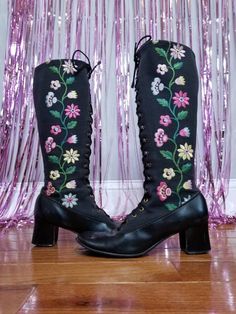 These incredible 1970s boots are so unique. They feature beautiful floral embroidery and front laces with a nice thick heel. In good vintage condition. Measurements are in the photos. Penny Lane Boots, Vintage Embroidered Boots For Fall, 70s Hippie Boots, 1970’s Shoes, Vintage Floral Boots, Matching Skirt Set, Embroidered Boots, Penny Lane, 70s Inspired Fashion