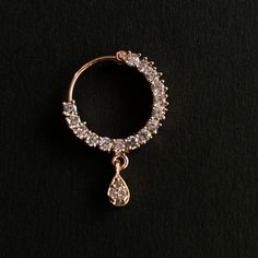 Name of Product: Bridal Traditional Jewelry Indian Antique Nose Ring. It requires a hole in the nose ( piercing is required ) Color: Rose Gold Material: Copper Unfortunately no exchanges /refunds due to hygiene reasons Diameter: 1 / 1.8 Centimeter Shipping processing time: 1-3 days Delivery time: depend on countries To view our latest collection of Nose rings / Nath please click the below link. https://www.etsy.com/uk/shop/HemrajJewellers?ref=seller-platform-mcnav&section_id=30100702 Jewelry Rose Gold Body Jewelry For Wedding, Wedding Hoop Septum Ring, Elegant Wedding Septum Ring With Prong Setting, Elegant Rose Gold Septum Ring For Wedding, Sparkling Hoop Jewelry For Wedding, Gold Diamond Nose Ring For Wedding, Cubic Zirconia Nose Rings With Prong Setting For Wedding, Gold Cubic Zirconia Nose Rings For Wedding, Wedding Nose Rings With Cubic Zirconia Prong Setting