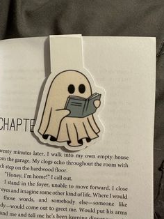 a book with an image of a ghost holding a book in it's hand