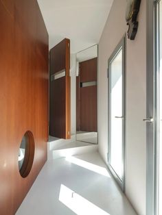 MISA 9.5 Penthouse in Torre Romana by Sciveres Guarini Associates: Reviving Mid-Century Charm | ArchEyes Ceiling Panels, Concrete Wall