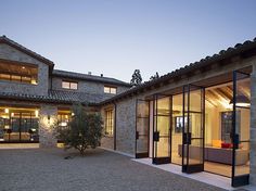 an outside view of a house at dusk