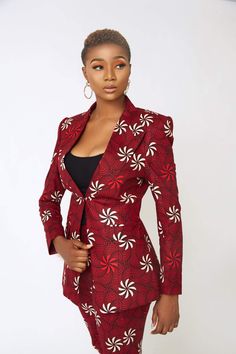 This is piece is called the Larissa Red Ankara Suit. The suit features: A fully lined jacket with one button Trouser with two side pockets, a zipper and trouser hook. Item is tailored to sizing preference Suit is tailored to sizing preference. Please provide the following measurements when placing your order:- Shoulder “- Sleeves “- Round sleeves “- Bust”- Upper waist (belle button)- Lower waist (pants level)- Hips”- Thigh(lap)- Calf- Length of trouser(waist 2 ankle)- Waist to floor Please note Ankara Suit, African Maxi Skirt, Ankara Jackets, African Suit, Low Waist Pants, Red Two Piece, Happy Dresses, Blazer Jackets For Women, Elegant Dresses Classy