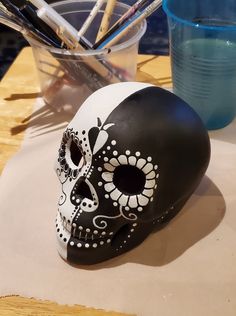 a black and white skull sitting on top of a table