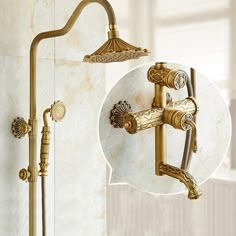 an antique style shower faucet with thermostaer and hand shower head