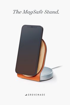 an image of a cell phone on a stand with the text, the magsafe stand