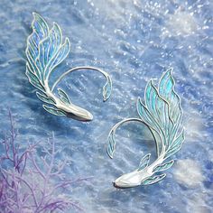 Fish earring jewelry, Pisces Ear cuff with piercing, mermaid - Inspire Uplift Elven Cosplay, Elf Ear, Elf Ear Cuff, Ear Cuff Jewelry, Elf Ears, Mermaid Earrings, Mermaid Inspired, Magical Jewelry, Silver Ear Cuff