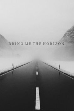 an empty road with the words bring me the horizon written on it in black and white