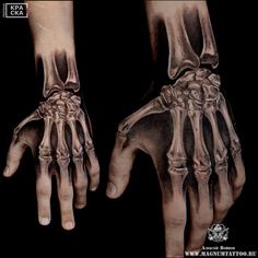 two hands with skeleton bones on them