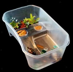 a plastic container filled with different types of food