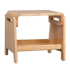 a small wooden step stool with one foot on it