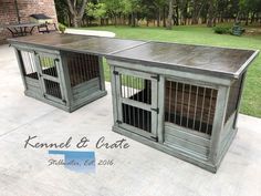 two dog kennels sitting on top of a patio