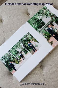 an open photo book sitting on top of a chair next to a couple's wedding pictures