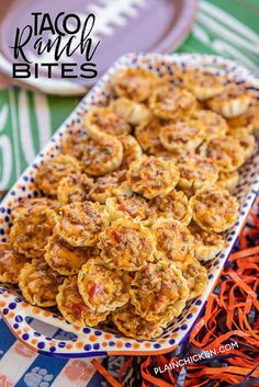 taco ranch bites on a platter with shredded carrots in the foreground