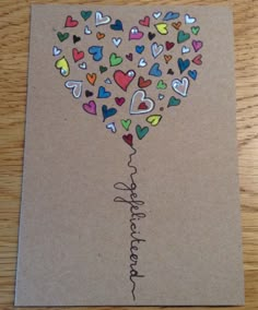 a card with hearts and the word congratulations written on it