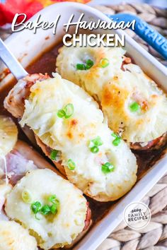 baked ham and cheese stuffed potatoes in a casserole dish with text overlay