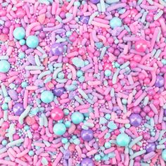 pink and blue sprinkles are mixed together