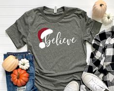 Believe Christmas Shirt, Christmas Believe Shirt, Christmas Party Shirt, Christmas Shirt,Christmas Family Shirt,Believe Shirt,Christmas Gift Welcome to Style Art US! 𝐒𝐈𝐙E  𝗔ND 𝐂𝐎𝐋𝐎𝐑𝐒: For size and color options, please see the listing images. Unisex T-shirts are Gildan brand (Unisex White, Natural, and Heather Mauve are Bella-Canvas brand)  Youth and Toddler T-shirts are Bella Canvas brand. All T-shirts are soft cotton, light fabric (4.2 oz/yd² ). The unisex style t-shirts run true for Christmas Believe, Christmas Party Shirt, Christmas Family Shirt, Believe Christmas, Tshirt For Women, Christmas Party Shirts, Style T Shirts, Family Tees, Dtf Printing